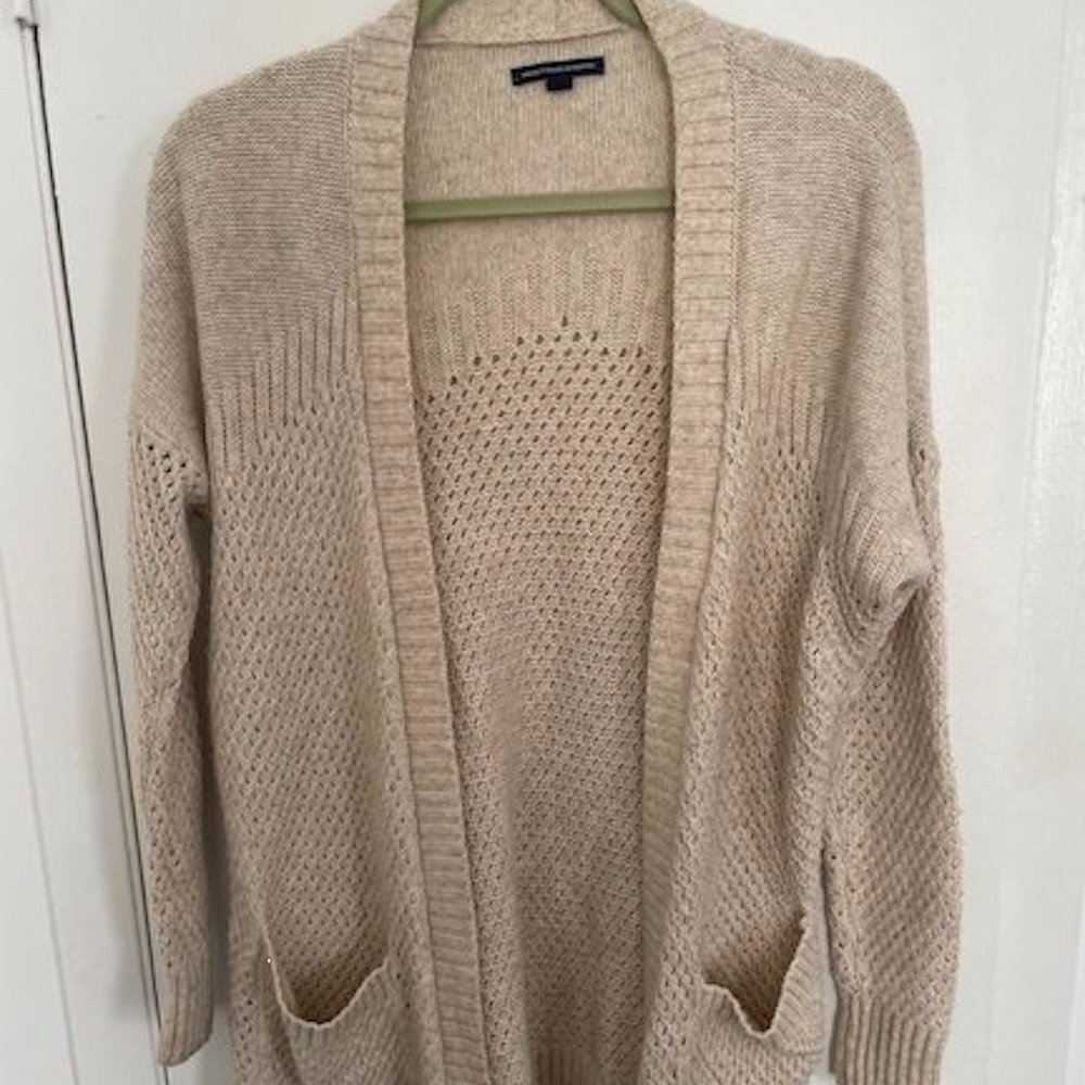 Mid-length cream cardigan